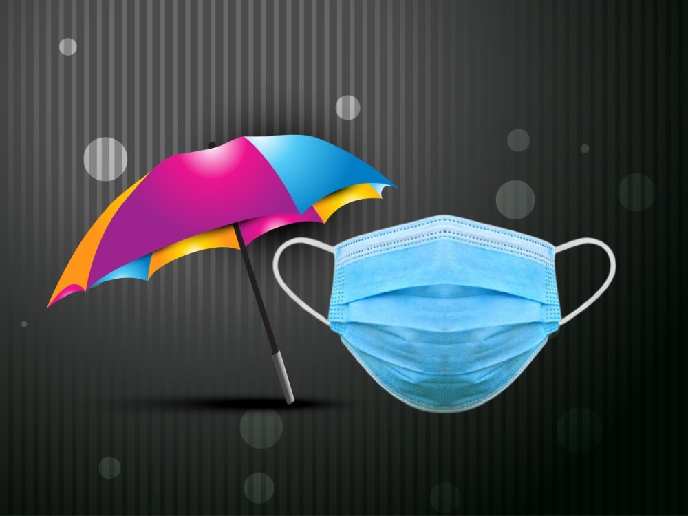 paraguas y mascarilla protectora