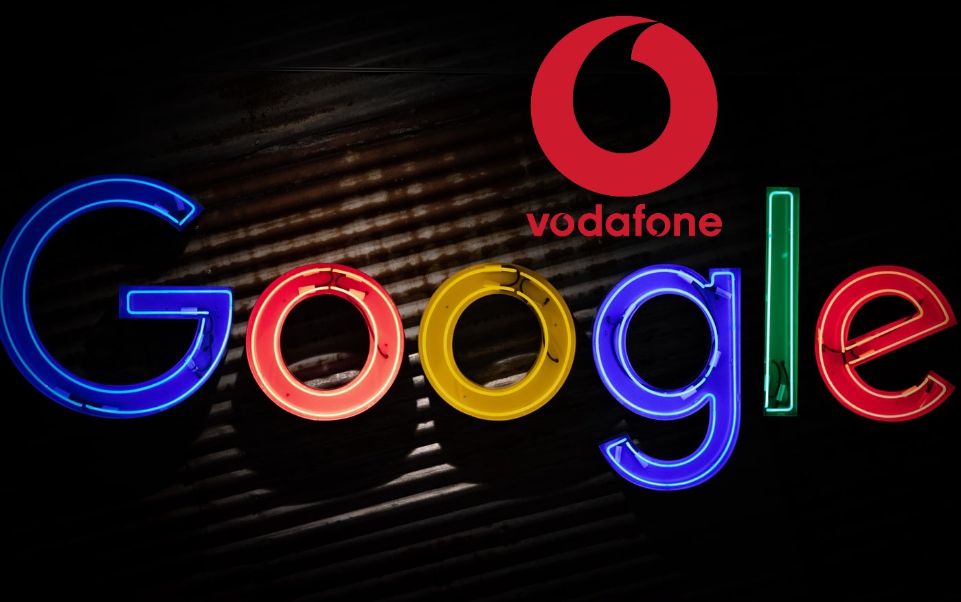 logos de Google y Vodafone sobre fondo oscuro